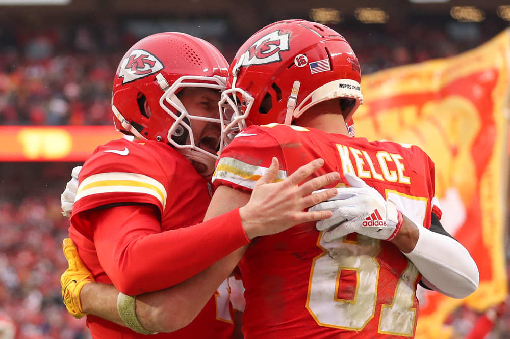 Travis Kelce Embraces Teammate