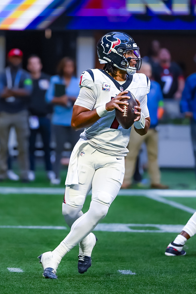 CJ Stroud Dropping Back CJ Stroud Dropping Back